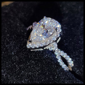 1 ct. Moissanite Pear Halo Ring